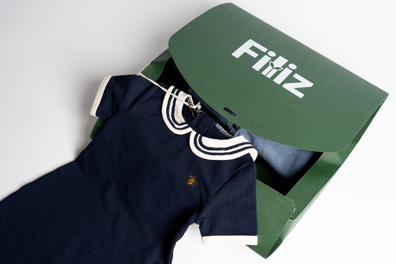 Open Filiz subscription box with organic baby clothes